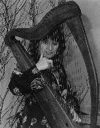 Mary behind small harp